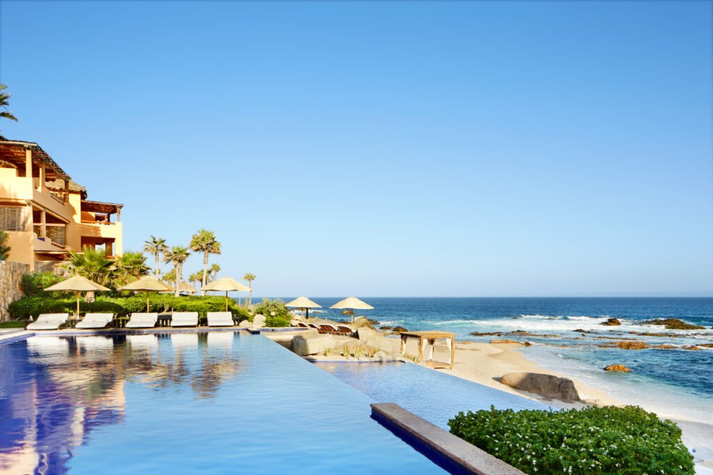 Infinity swimming pool at a luxury resort on the beach
