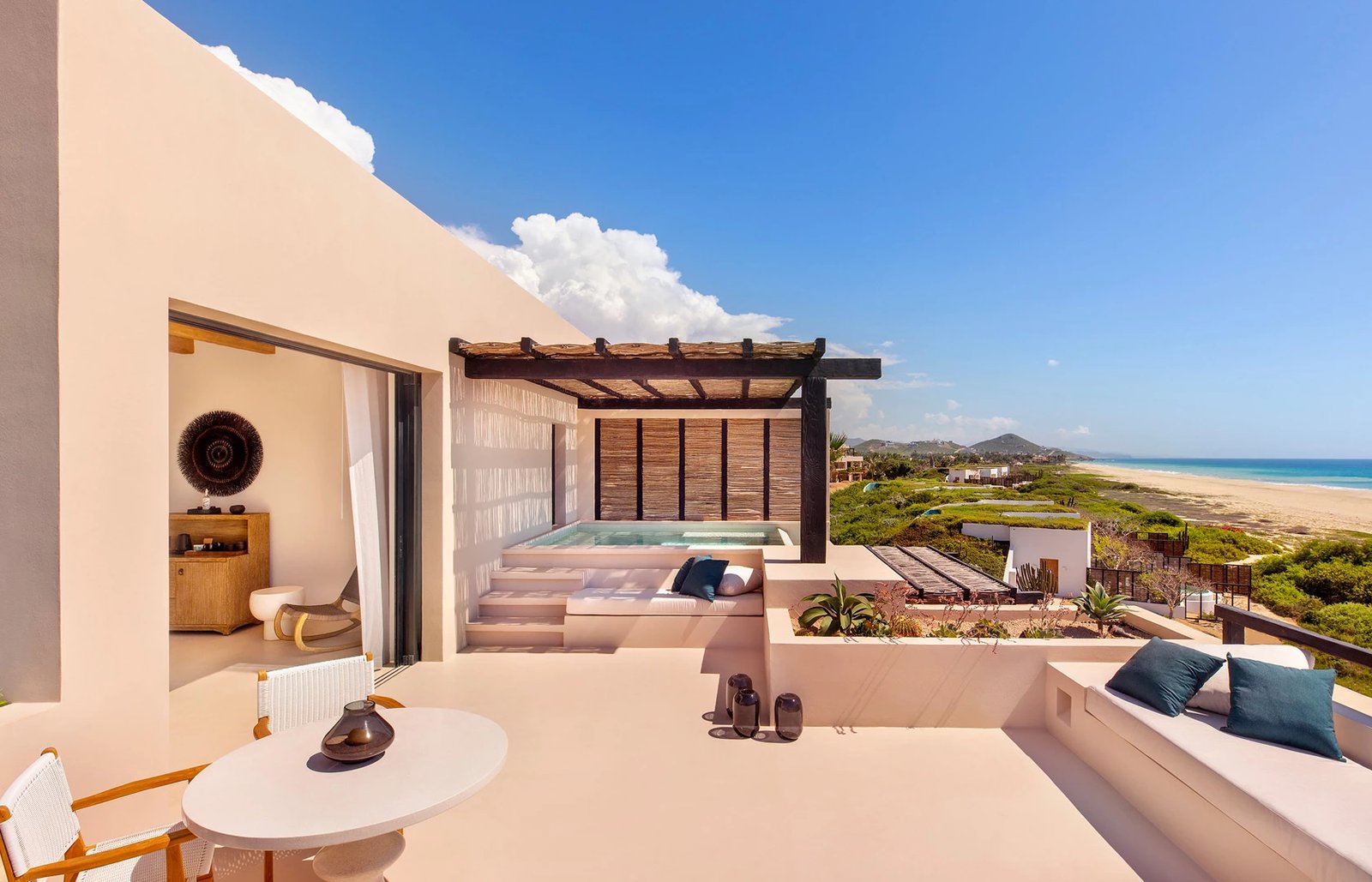 private patio and plunge pool overlooking pacific ocean at luxury boutique hotel